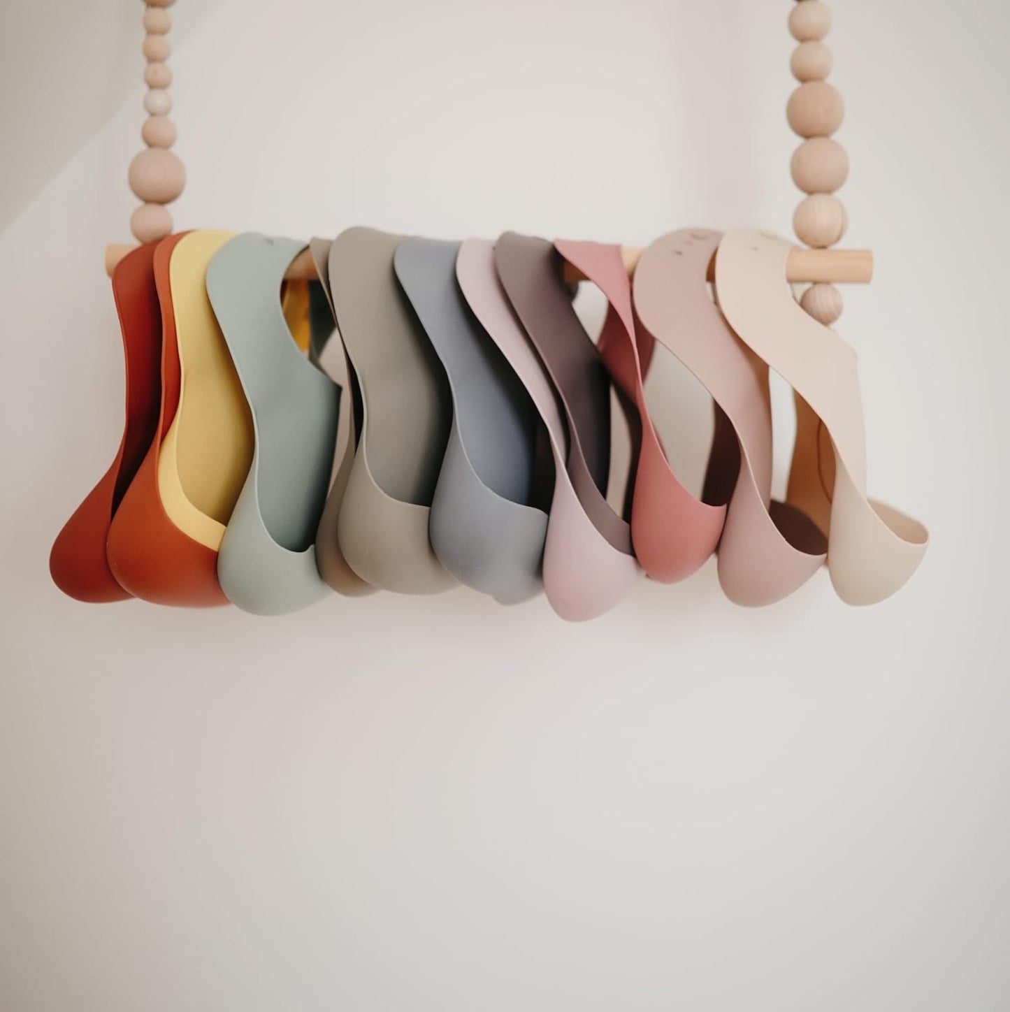 mushie Silicone Baby Bib | Adjustable Fit Waterproof Bibs (Shifting Sand)