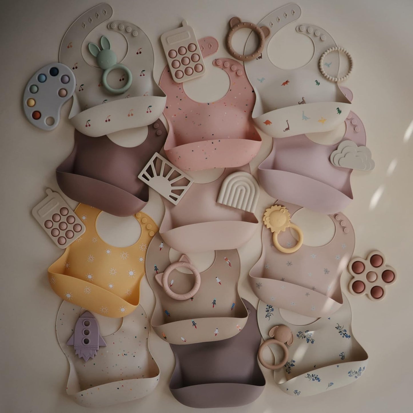 mushie Silicone Baby Bib | Adjustable Fit Waterproof Bibs (Dusty Rose)