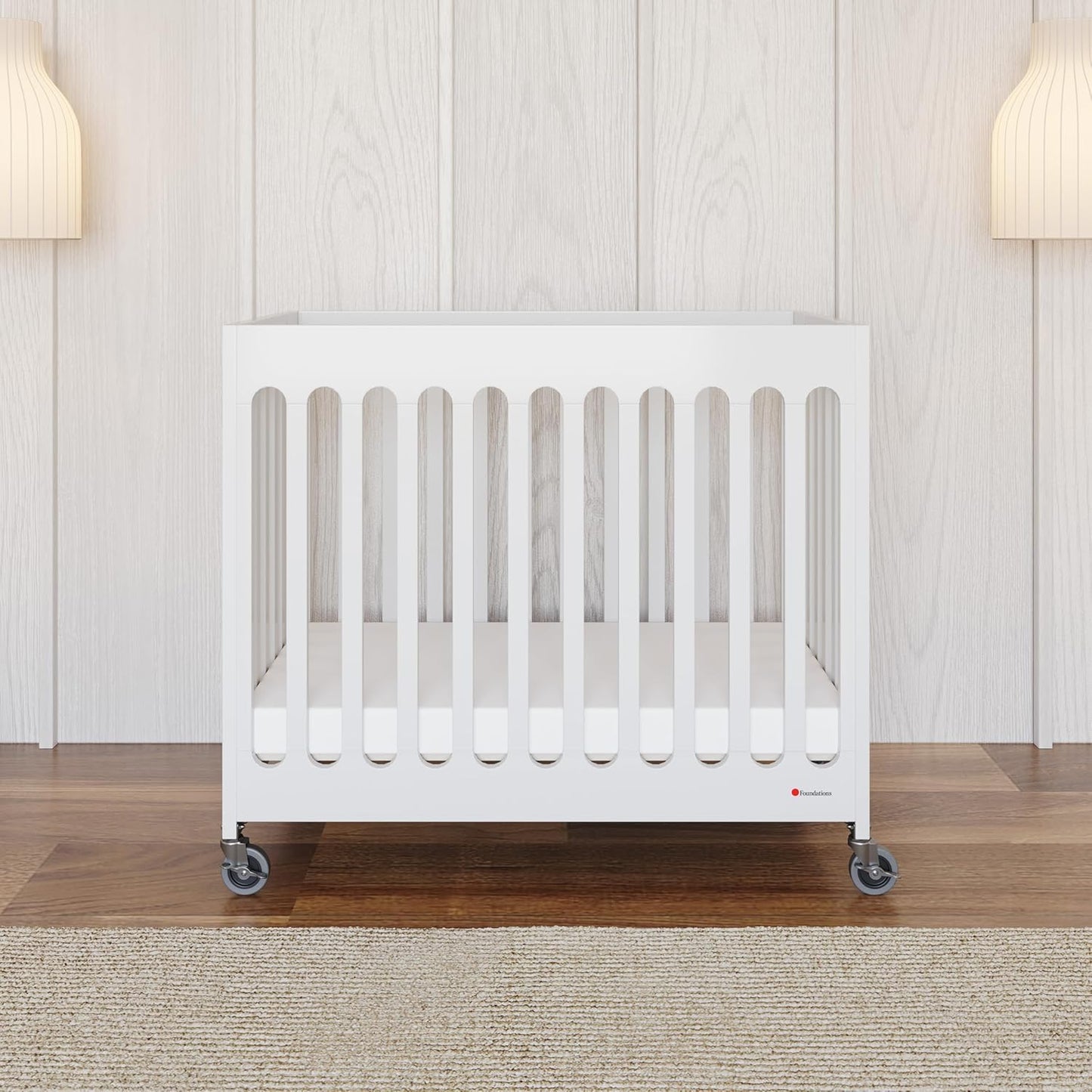 Foundations Boutique Folding Mini Baby Crib - Compact, Portable, Wooden Hotel Crib, Foldable Compact Cribs for Baby & Toddlers - Includes 3" Foam Mattress - White